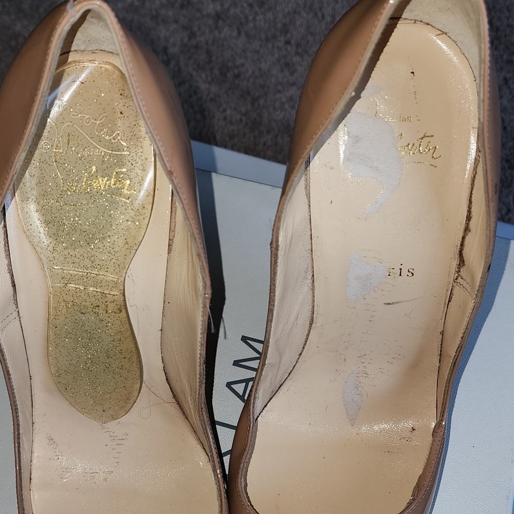 Authentic Christian Louboutin Nude Tan Patent Leather Pointed Pumps.